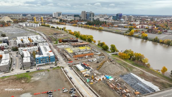 West Sacramento's Bridge District expands with new housing, office, and retail spaces.